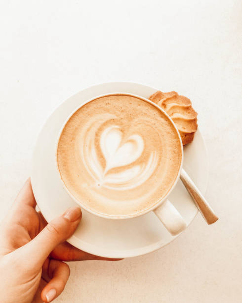 istock coffee cappuccino cup with heart shaped milk foam 1268222089