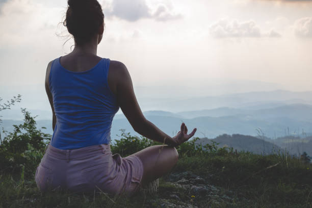 istock Woman practicing yoga in nature 1268223336