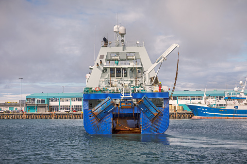 Reykjavik, Iceland, July 16, 2020: Modern trawler in harbor in Reykjavik, the capital of Iceland. The fishing fleet is one of the biggest industries in the country and many of the boats are big and new
