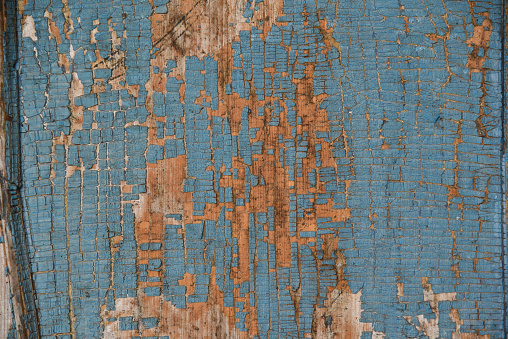 Texture of white paint drips on rusty metal background
