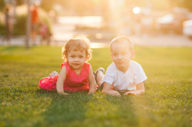 istock Two kids having fun outdoors 1268229749
