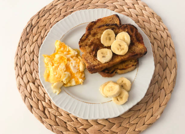 FRENCH TOAST WITH BANANA AND SCRAMBLED EGG FOR BREAKFAST
