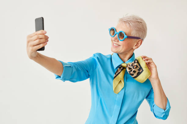 istock Senior woman making selfie 1268230977