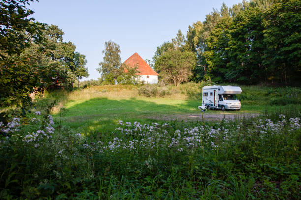 Parking Motorhome in Forest. stock photo