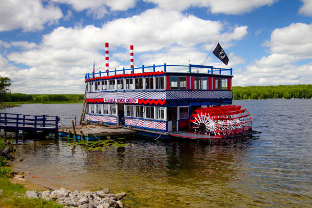Oscoda, Michigan, USA - July 20, 2020: The Au Sable River Queen offers tourist scenic cruises along the famous Au Sable River in Huron Manistee National Forest in northern Michigan.