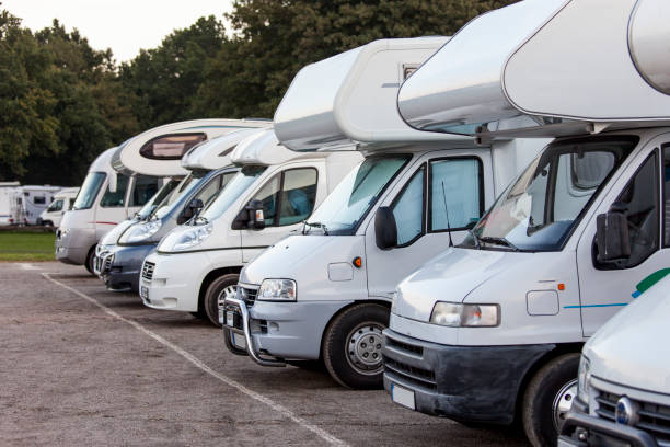 Motor Homes Motorhomes parked at motorhome campground. camper trailer stock pictures, royalty-free photos & images