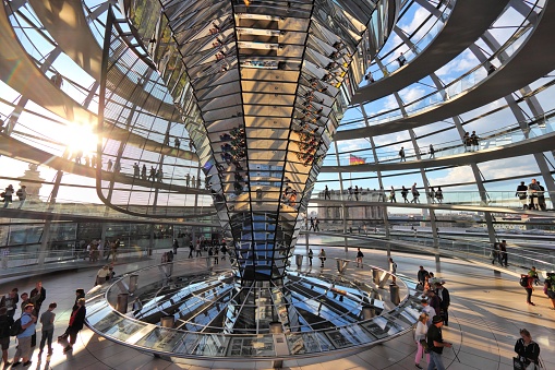 People visit Reichstag building dome in Berlin. The dome was completed in 1999. It was designed by architect Norman Foster.