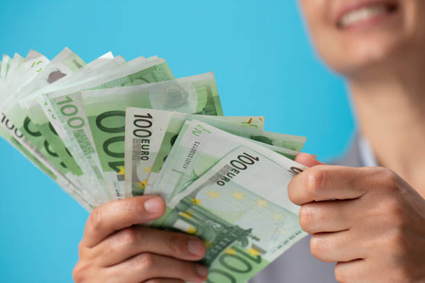 istock Women Giving Euro 1268238934