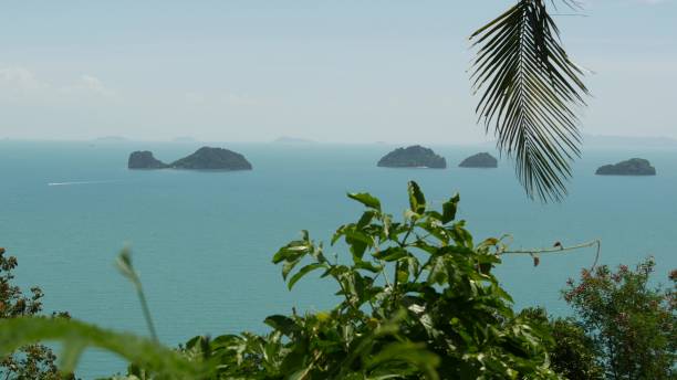 istock Five Sisters Islands in serene water surface. Enchanting landscape, greenery and deep calm water, Samui Thailand. Relax travel vacation holiday resort concept. Bird eye panoramic aerial drone top view 1268241603