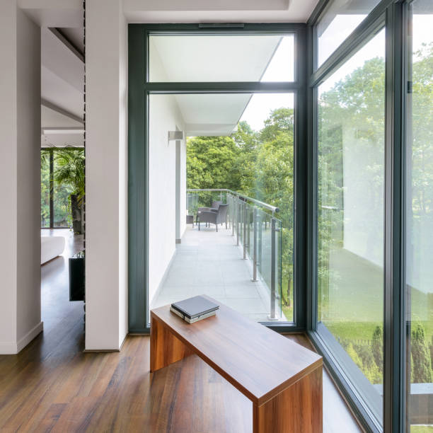 istock Modern corridor with balcony door 1268244623