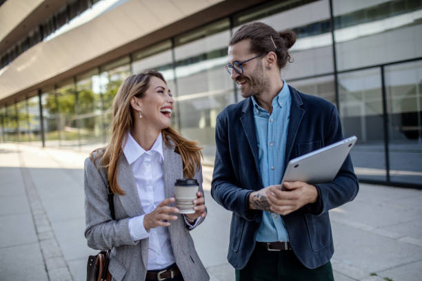 istock Young business couple on a coffee break 1268244625