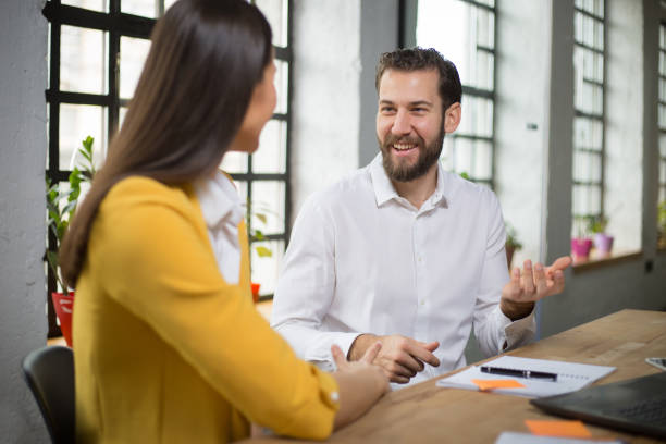 istock Young colleagues talking about business ideas 1268246250