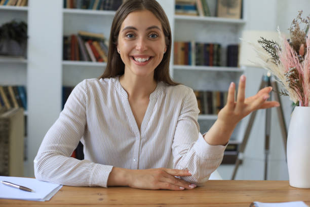istock Attractive cheerful business woman working in office. 1268247033