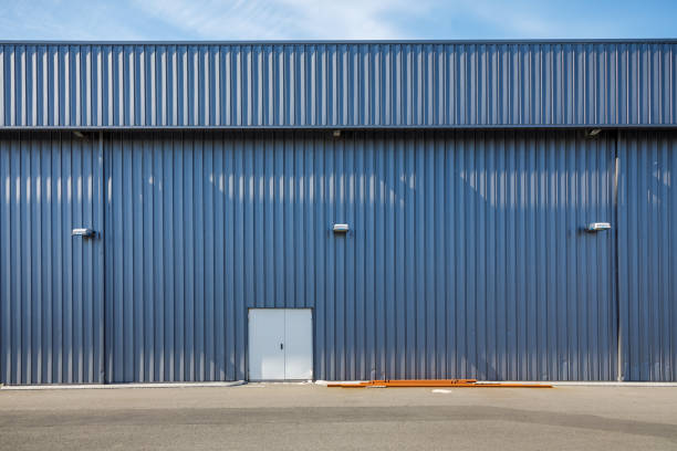 Door in a large blue building at the harbor in Reykjavik