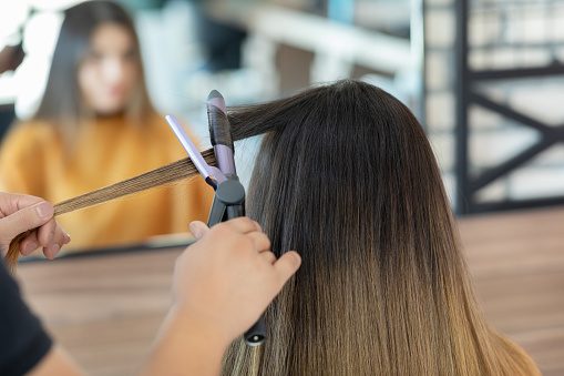 Hairdresser making a hairstyle