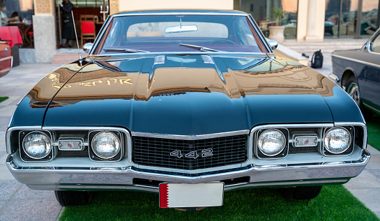 Doha, Qatar- March 30 2020 :1968 oldsmobile 442 classic car kept for exhibition at classic car show happened in pearl City.