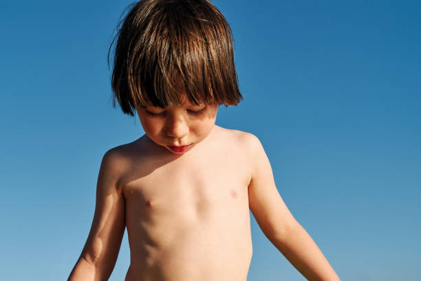 istock Cute child on beach at sunny day 1268261076