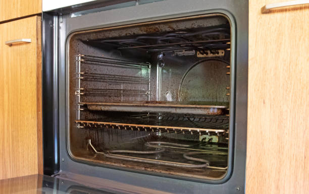 istock Old antique kitchen with dirty oven 1268262150