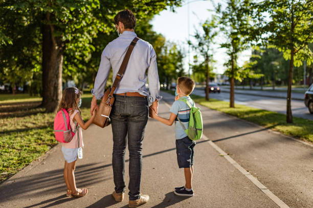 istock Boy and girl going back to school 1268262290