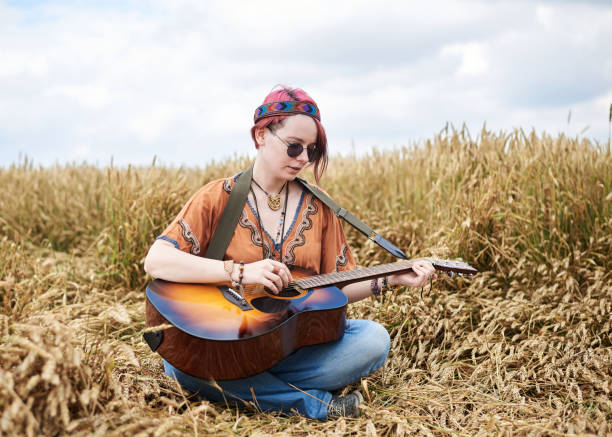 istock Hippie women on wheat filed 1268263531