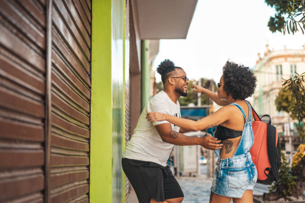 istock People hugging outdoors 1268264078
