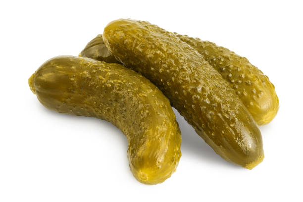 istock Marinated pickled cucumber isolated on white background with clipping path and full depth of field 1268265916