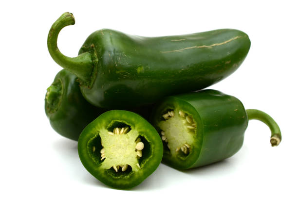 istock jalapeno pepper slices stacking isolated white 1268265955