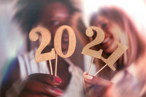 istock Woman celebrating 2021 New Year 1268266218