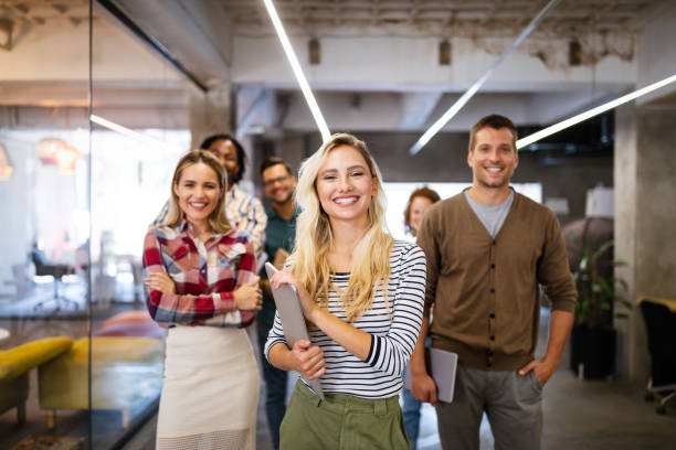 istock Successful group of designers, business people at work in office 1268268367