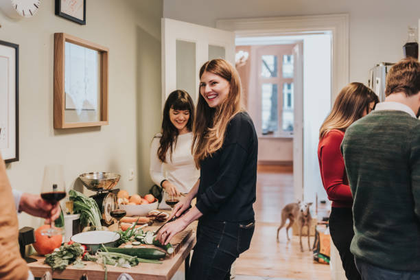 istock young people cooking together in kitchen and having fun 1268269190