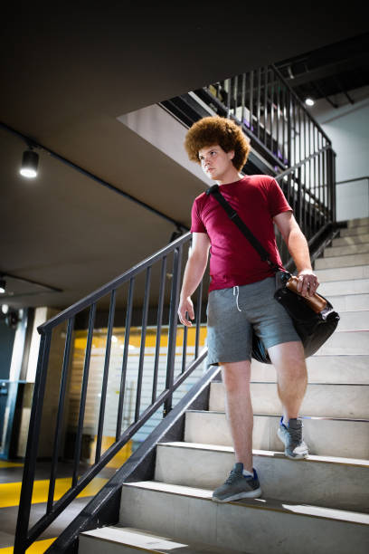 istock Tired fat man thinking over weight problems, desire to lose weight, gym workout 1268270778