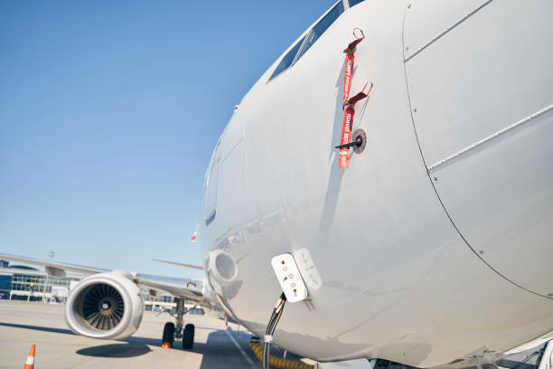 istock Landed airliner being serviced at an airport 1268273377