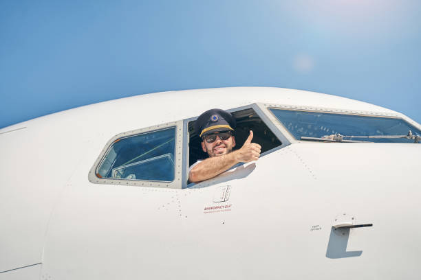 istock Airline pilot showing his readiness for take-off 1268273471