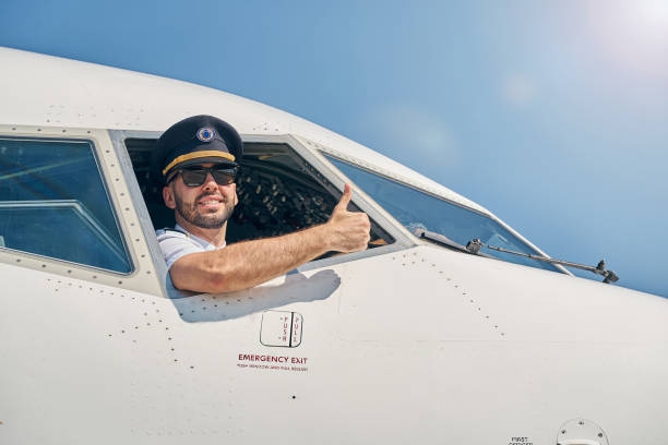 istock Smiling airman demonstrating his readiness for flight 1268273496