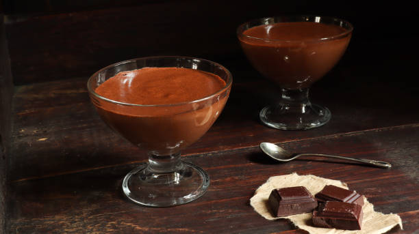 istock Chocolate mousse in a bowl on the old dark brown table background 1268273572