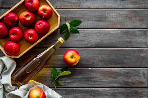 istock Bottle of apple organic vinegar or cider. Top view, copy space 1268274176