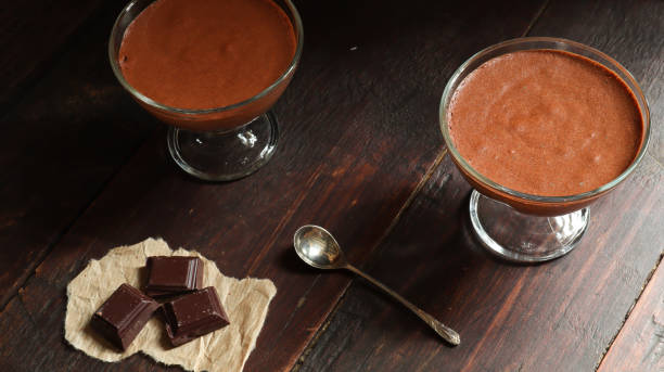 istock Chocolate mousse in a bowl on the old dark brown table background 1268274187