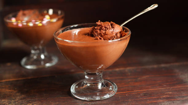istock Chocolate mousse in a bowl on the old dark brown table background 1268275509