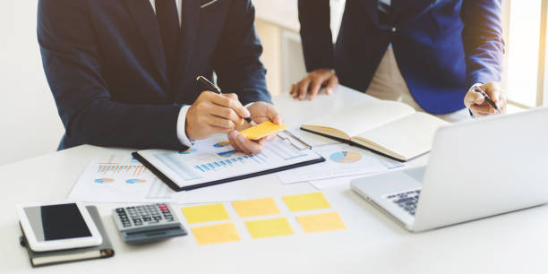 istock Investment concept, Investor planing financial data performance report. 1268285021