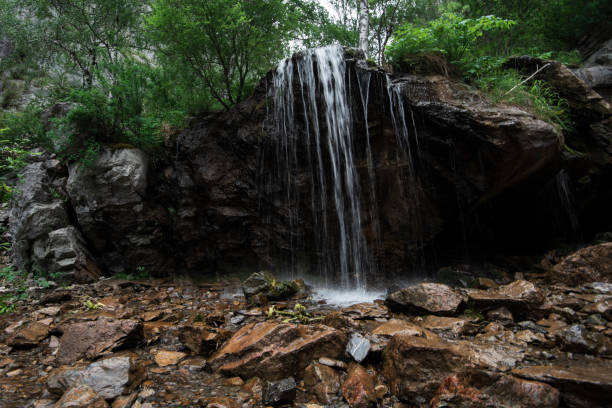 istock Waterfall Che-Chkish in Altai Mountains 1268285905