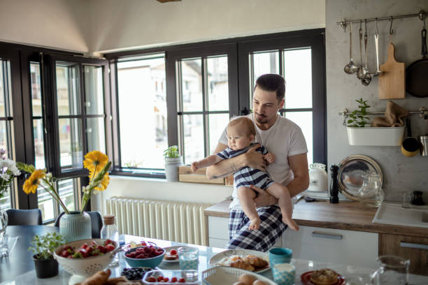istock Happy father and son in the kitchen 1268288368