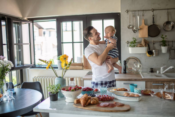istock Happy father and son in the kitchen 1268288665