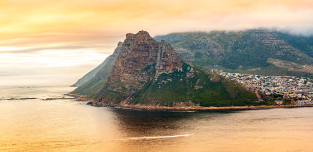 istock Sunset around ocean coast with mountain. 1268288998