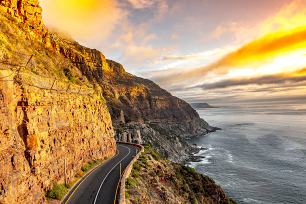 Chapman's Peak Drive near Cape Town in South Africa This image shows the famous Chapman's Peak Drive in Cape Town  South Africa. Amazing road with ocean and mountains can be seen in the image. chapmans peak drive stock pictures, royalty-free photos & images