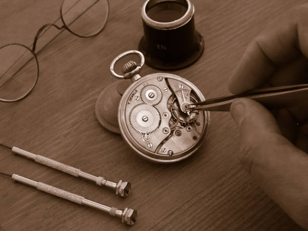 istock vintage pocket watch under repair 1268291614