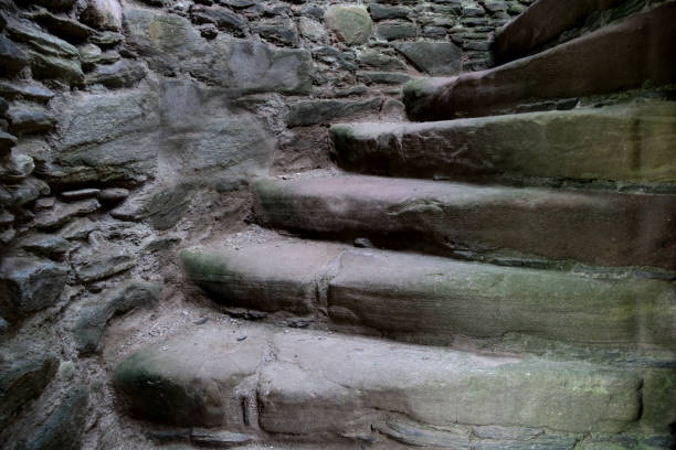 istock Ancient Stone Staircase in a Medieval Castle 1268291943
