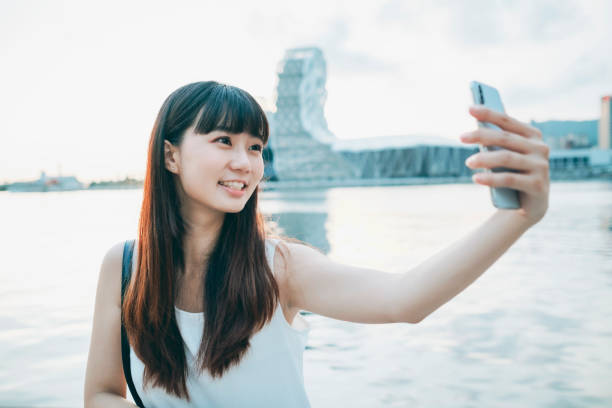 Asian woman smile take selfie