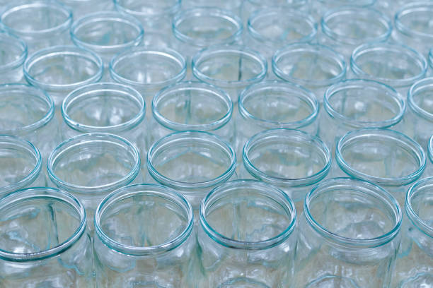 istock empty glass jars without lids of different sizes-empty jars for jam, honey, jam 1268293307