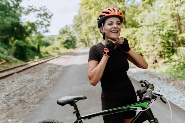 istock Woman getting ready for a bike ride 1268293879