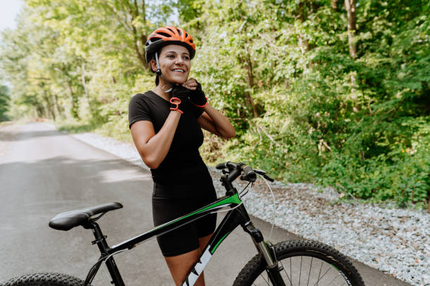 istock Woman getting ready for a bike ride 1268293896